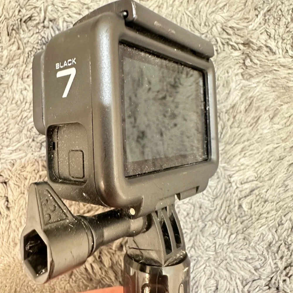 Go pro black 7, case, battery, and stick